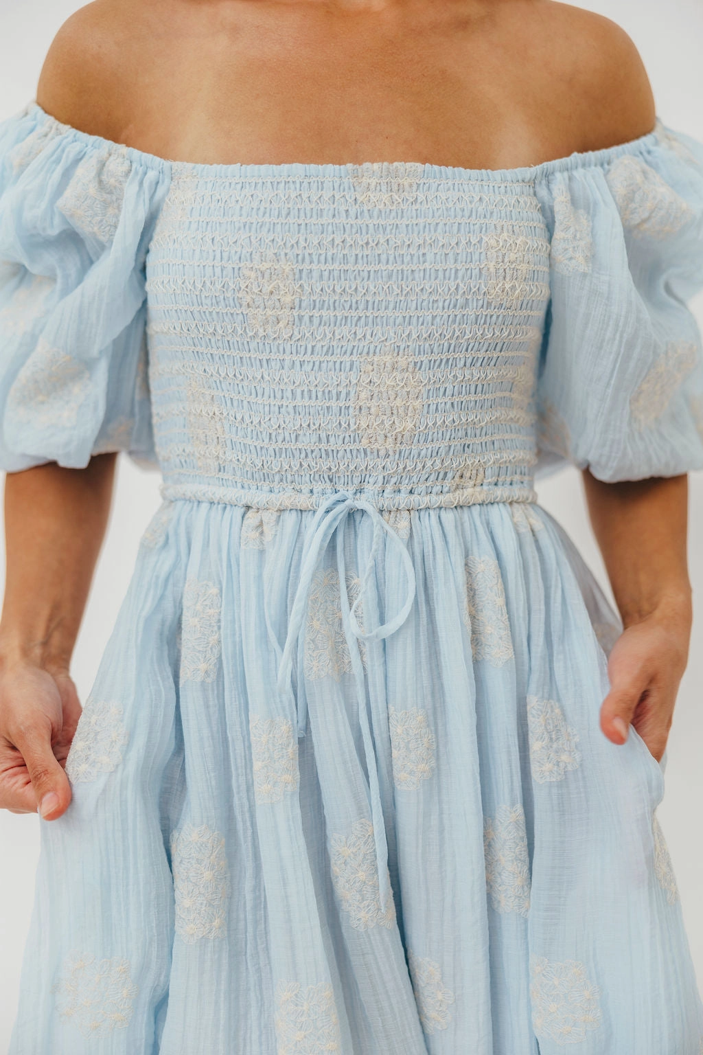 Raw-Hem A-Line Aimee Smocked Embroidered Floral Midi Dress in Blue