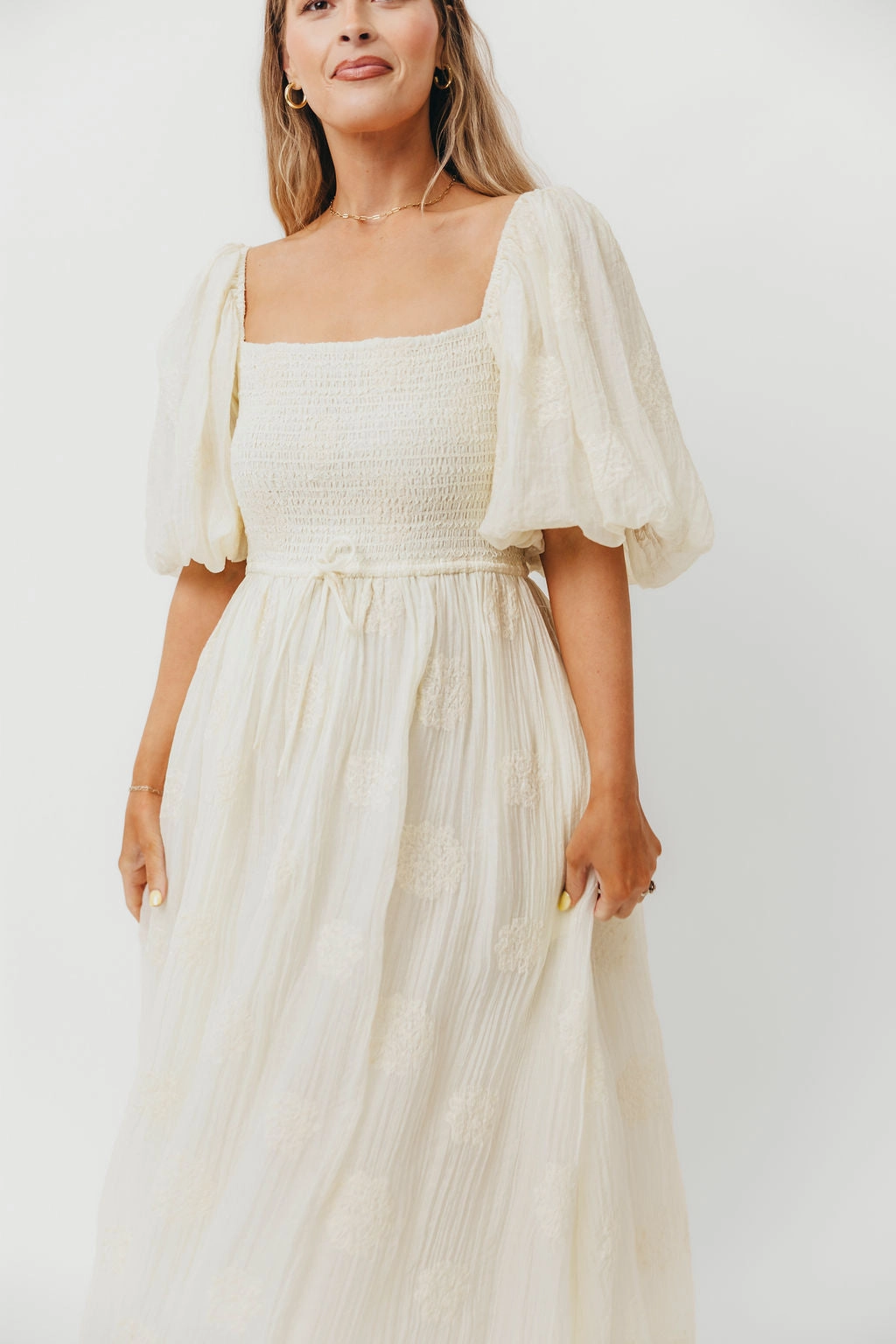 Flattering and Chic Chic Balance Aimee Smocked Embroidered Floral Midi Dress in Ivory