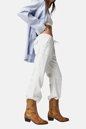 Free People Borderline Western Boots in Distressed Tan Traction Lug Pattern Reinforced Form Weekend Wanderer