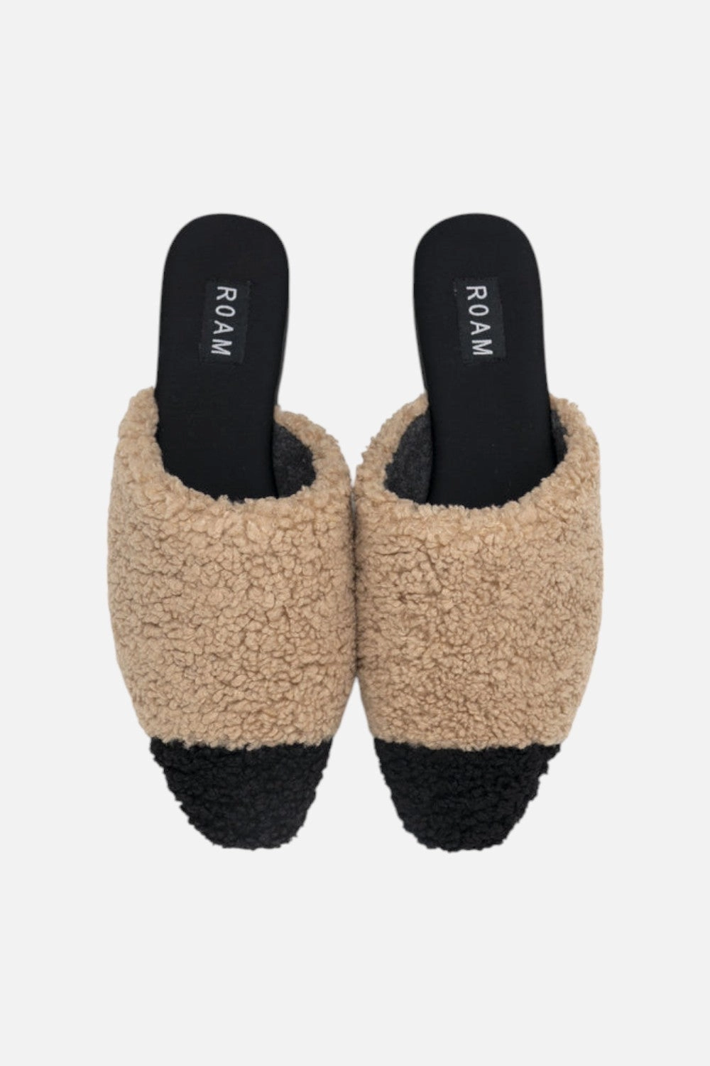 Velcro straps Arch support feature Roam Fuzzy Cap Mule in Beige Black Faux Shearling